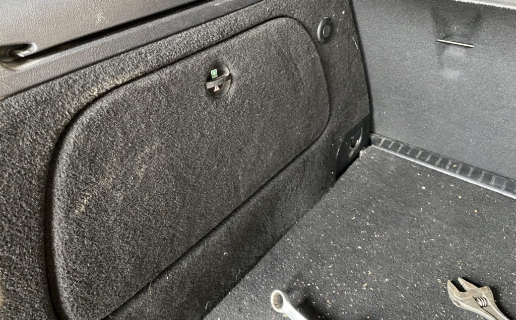 Fist aid kit area in trunk