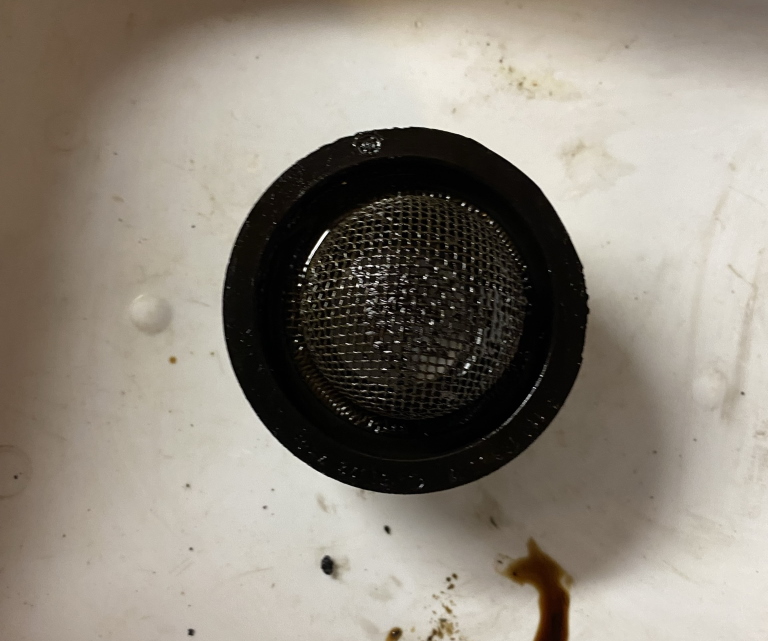 Dirty oil strainer for M110 engine